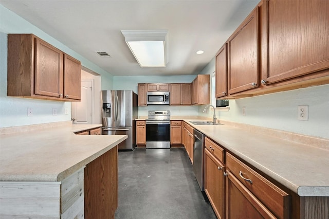 kitchen featuring appliances with stainless steel finishes and sink