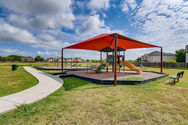 view of playground featuring a yard