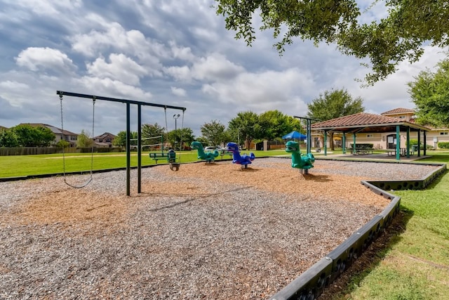 view of play area with a gazebo and a lawn