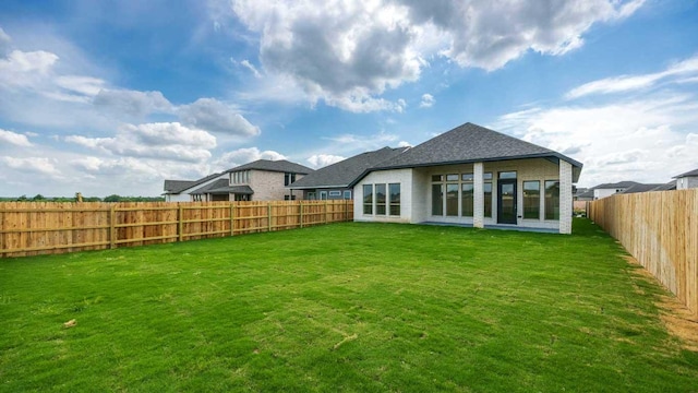 228 La Venta Loop, Liberty Hill, TX 78642 - back of property with roof with shingles