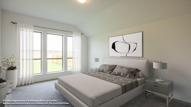 228 La Venta Loop, Liberty Hill, TX 78642 - bedroom with carpet floors, vaulted ceiling, and multiple windows