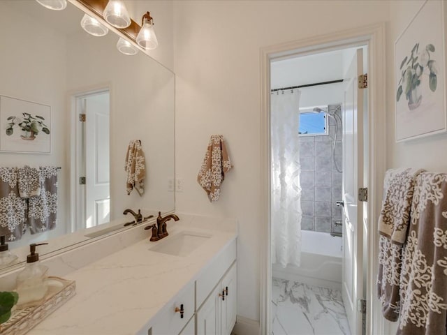 bathroom featuring vanity and shower / bath combination with curtain