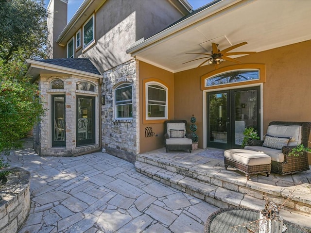 view of patio / terrace featuring ceiling fan and french doors