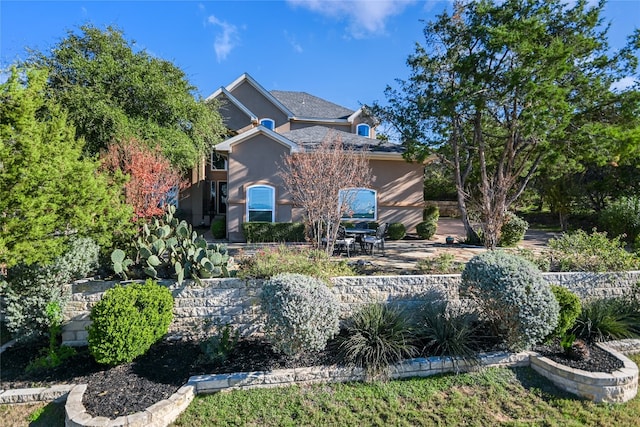 view of front of house featuring a patio