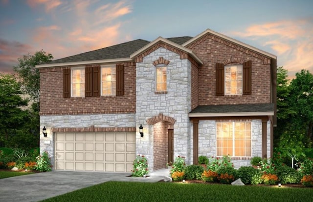 view of front of home with a garage