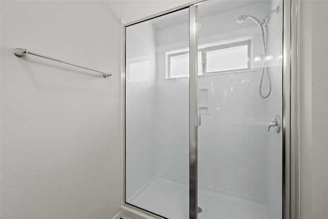 bathroom featuring walk in shower