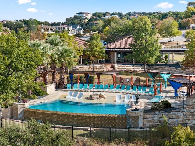 view of swimming pool featuring a gazebo