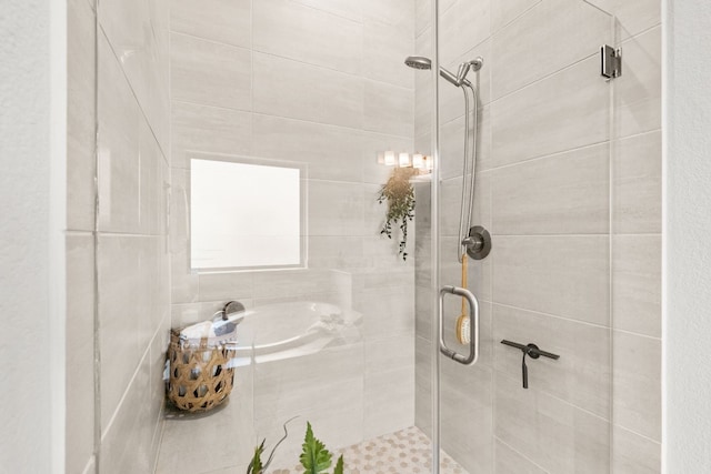 bathroom featuring an enclosed shower