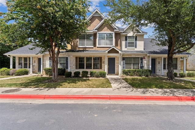 view of front of home featuring a front lawn