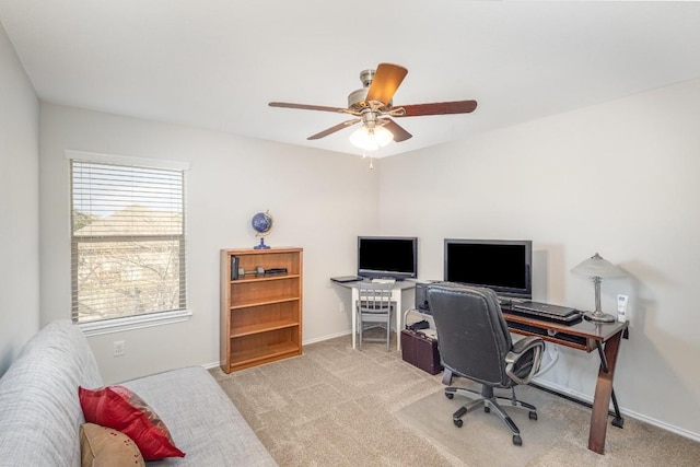 carpeted office with ceiling fan