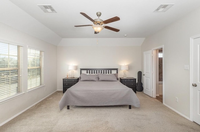 carpeted bedroom with ceiling fan and lofted ceiling