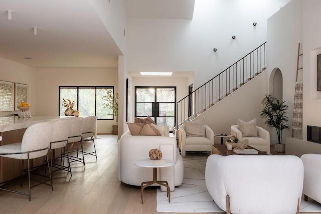 living room with light hardwood / wood-style flooring