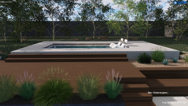 view of pool with a jacuzzi and a fenced backyard