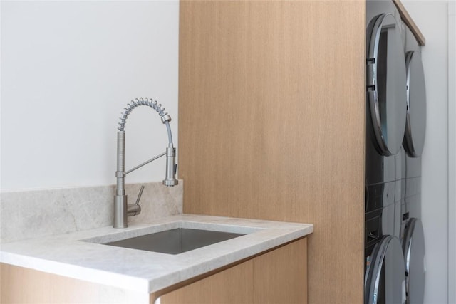 interior space featuring a sink and light brown cabinets
