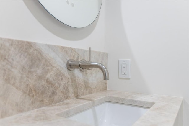 interior details featuring a sink