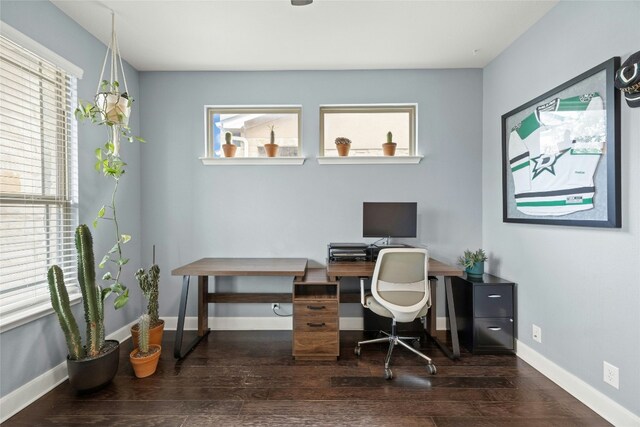 home office featuring wood finished floors and baseboards