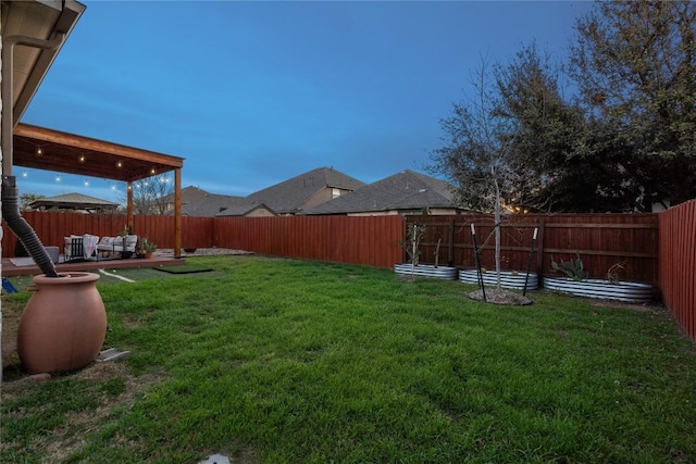 view of yard featuring a fenced backyard