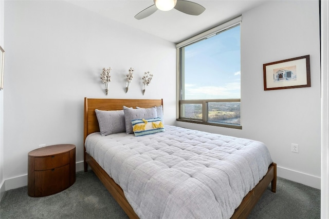 bedroom featuring ceiling fan and carpet floors