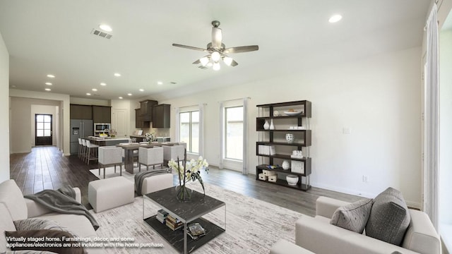 128 Spring Bluff Ln, Georgetown, TX 78628 - living area with plenty of natural light, dark wood-style flooring, recessed lighting, and ceiling fan