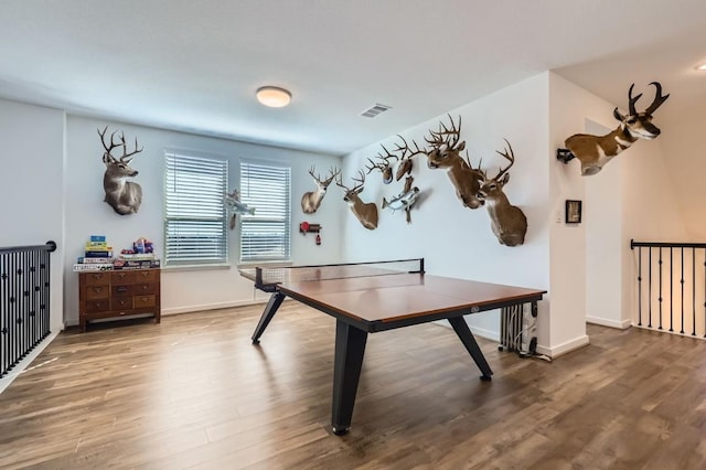 recreation room featuring wood-type flooring