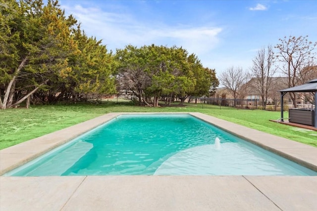 view of pool with a gazebo and a yard