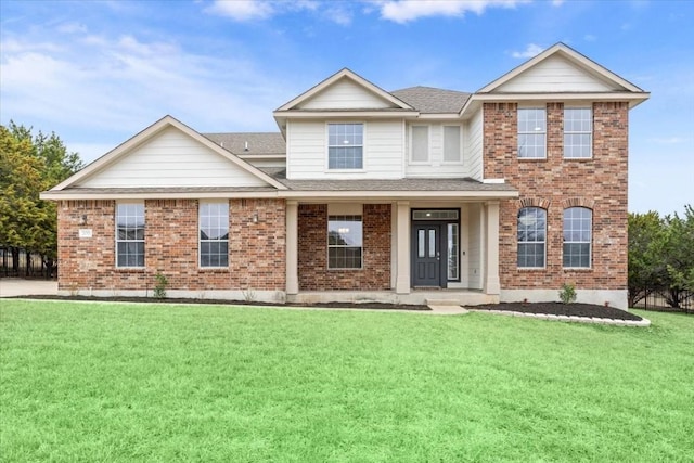 view of front of home featuring a front lawn