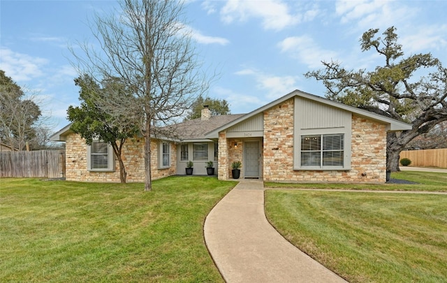 ranch-style house with a front yard