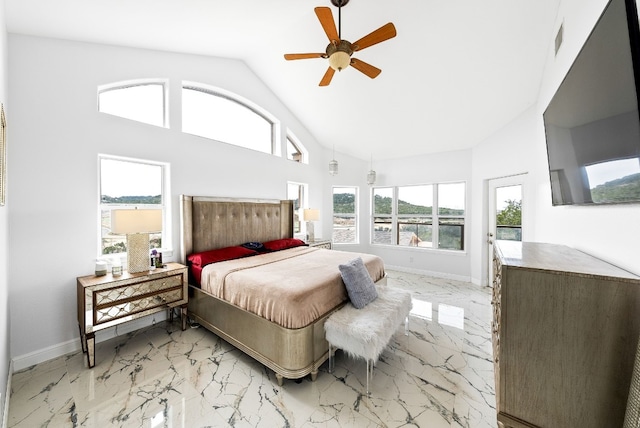 bedroom with a ceiling fan, marble finish floor, visible vents, and baseboards