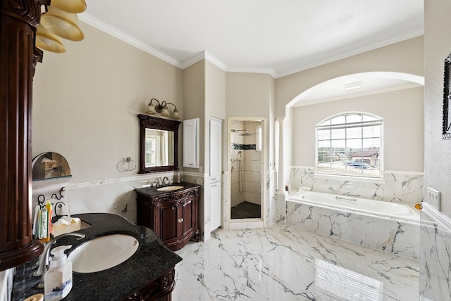 bathroom featuring marble finish floor, a sink, a shower stall, and a bath