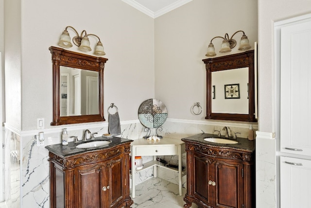 bathroom featuring marble finish floor, two vanities, and a sink