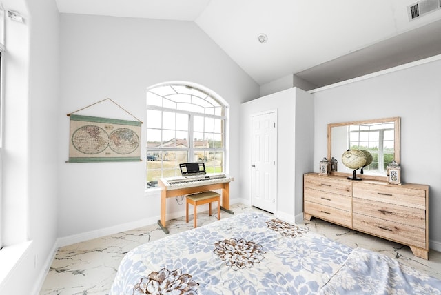 bedroom featuring marble finish floor, visible vents, vaulted ceiling, and baseboards