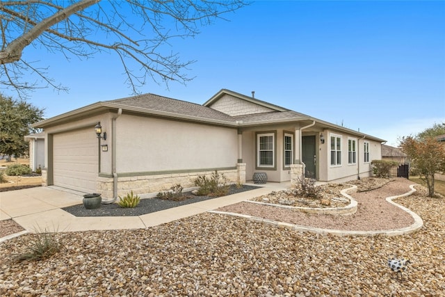 ranch-style home featuring a garage