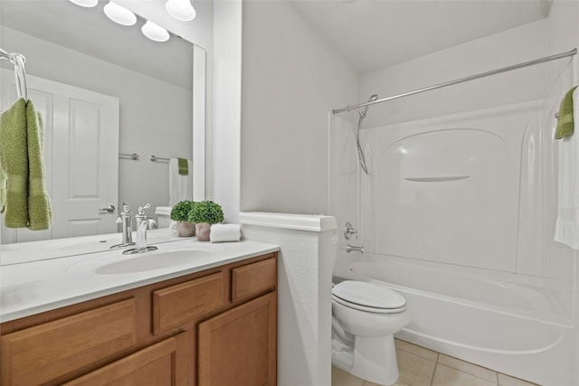 full bathroom with vanity, tub / shower combination, tile patterned floors, and toilet