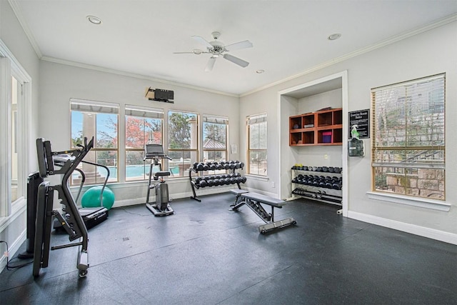 exercise room featuring ornamental molding and ceiling fan