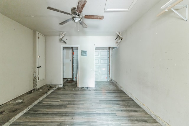 spare room with hardwood / wood-style flooring and ceiling fan