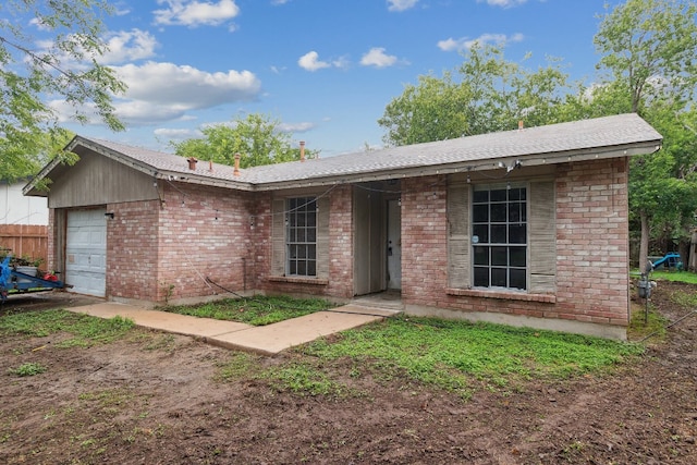 single story home with a garage