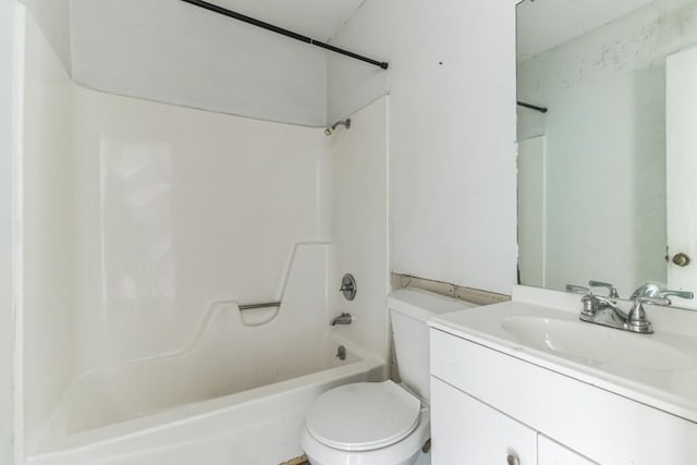 full bathroom featuring vanity, bathtub / shower combination, and toilet