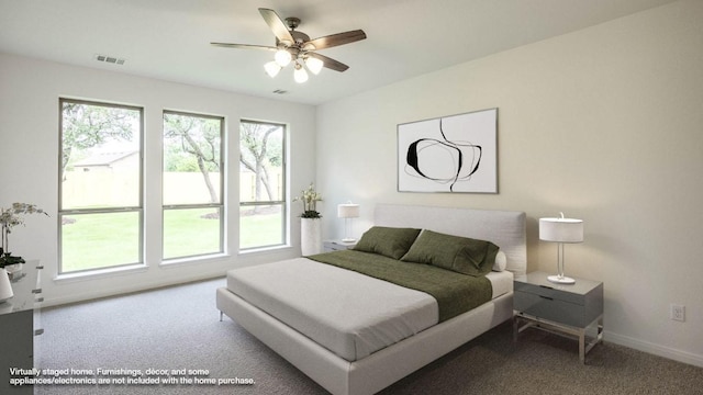 140 Spring Bluff Ln, Georgetown, TX 78628 - bedroom with carpet and a ceiling fan