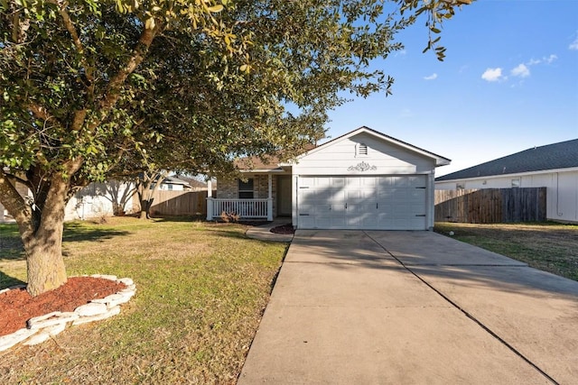 512 Mitchell Dr, Hutto, TX 78634 - view of front facade featuring a garage and driveway