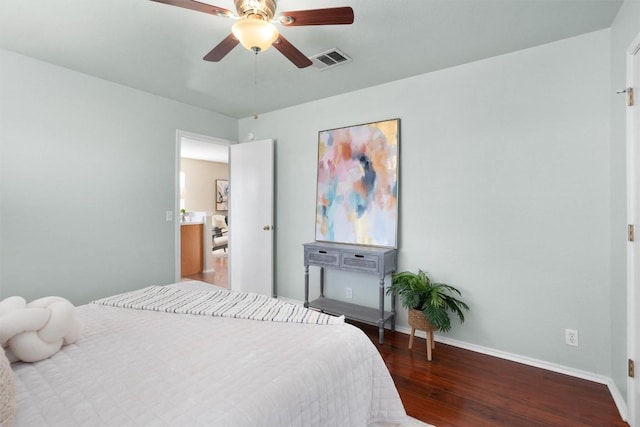 bedroom featuring ceiling fan and dark hardwood / wood-style floors