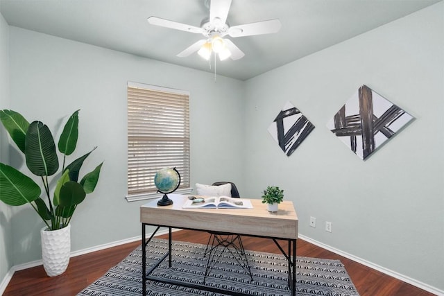 office featuring dark wood-type flooring and ceiling fan