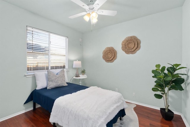 512 Mitchell Dr, Hutto, TX 78634 - bedroom featuring wood finished floors and a ceiling fan