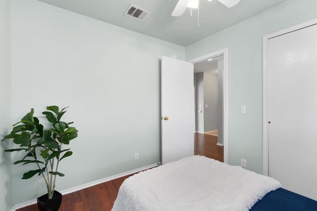 512 Mitchell Dr, Hutto, TX 78634 - bedroom with dark wood-style floors and ceiling fan