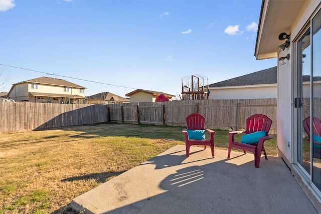512 Mitchell Dr, Hutto, TX 78634 - fenced backyard featuring a patio area