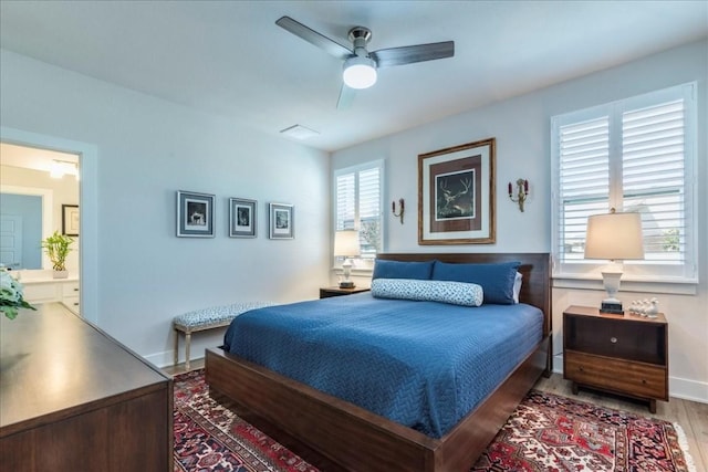 bedroom featuring hardwood / wood-style floors and ceiling fan