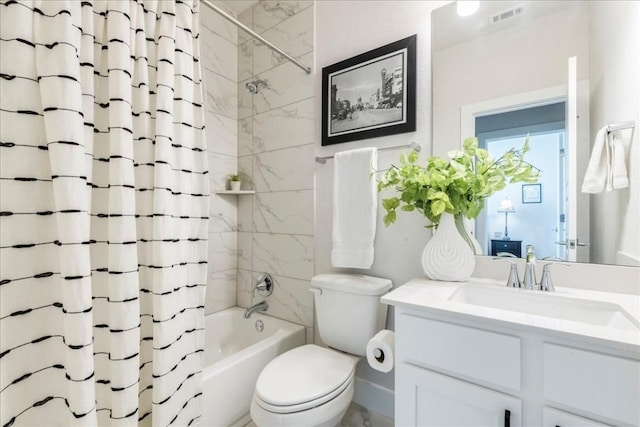 full bathroom with vanity, toilet, and shower / bath combo