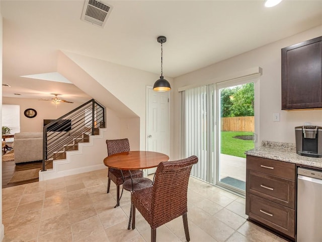 dining space featuring ceiling fan