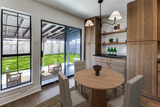 dining room featuring dark wood-type flooring