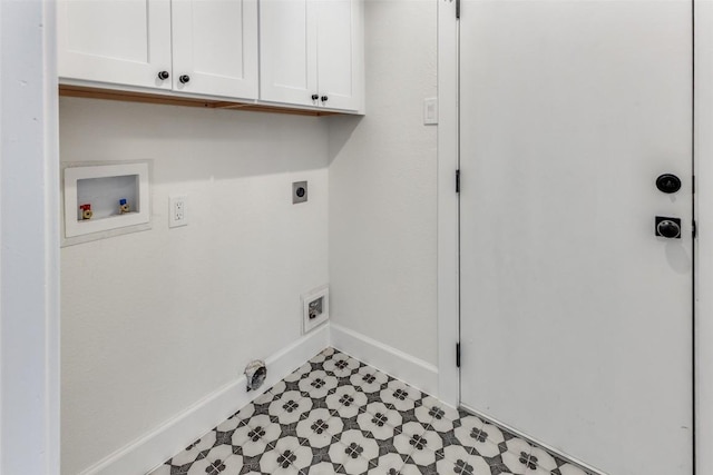 washroom with cabinets, hookup for a washing machine, and electric dryer hookup