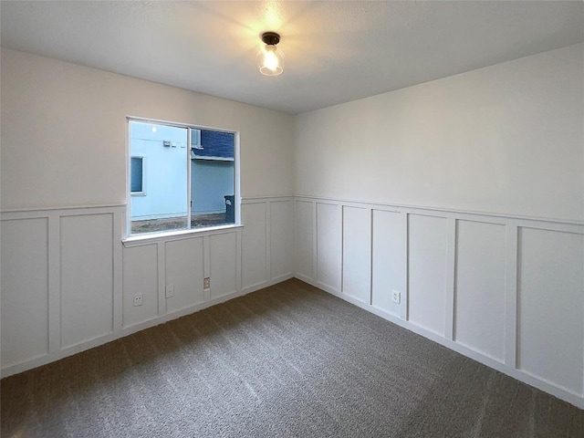 spare room with carpet floors